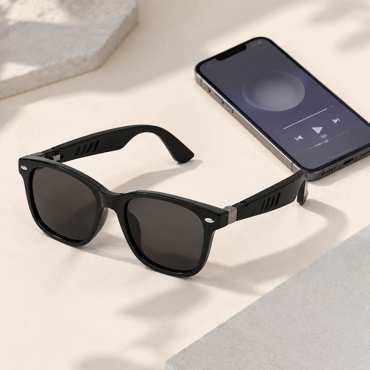 Cubey SoundLens audio sunglasses paired with a smartphone