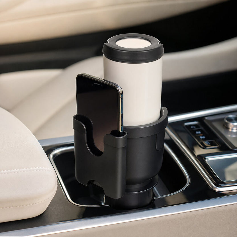 Cubey CupMate holding a drink and phone in a modern car console